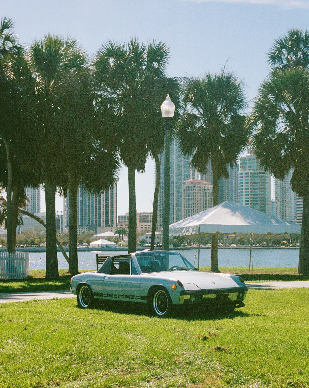 Classic convertible automobile parked along the Rambla waterfront promenade in Montevideo