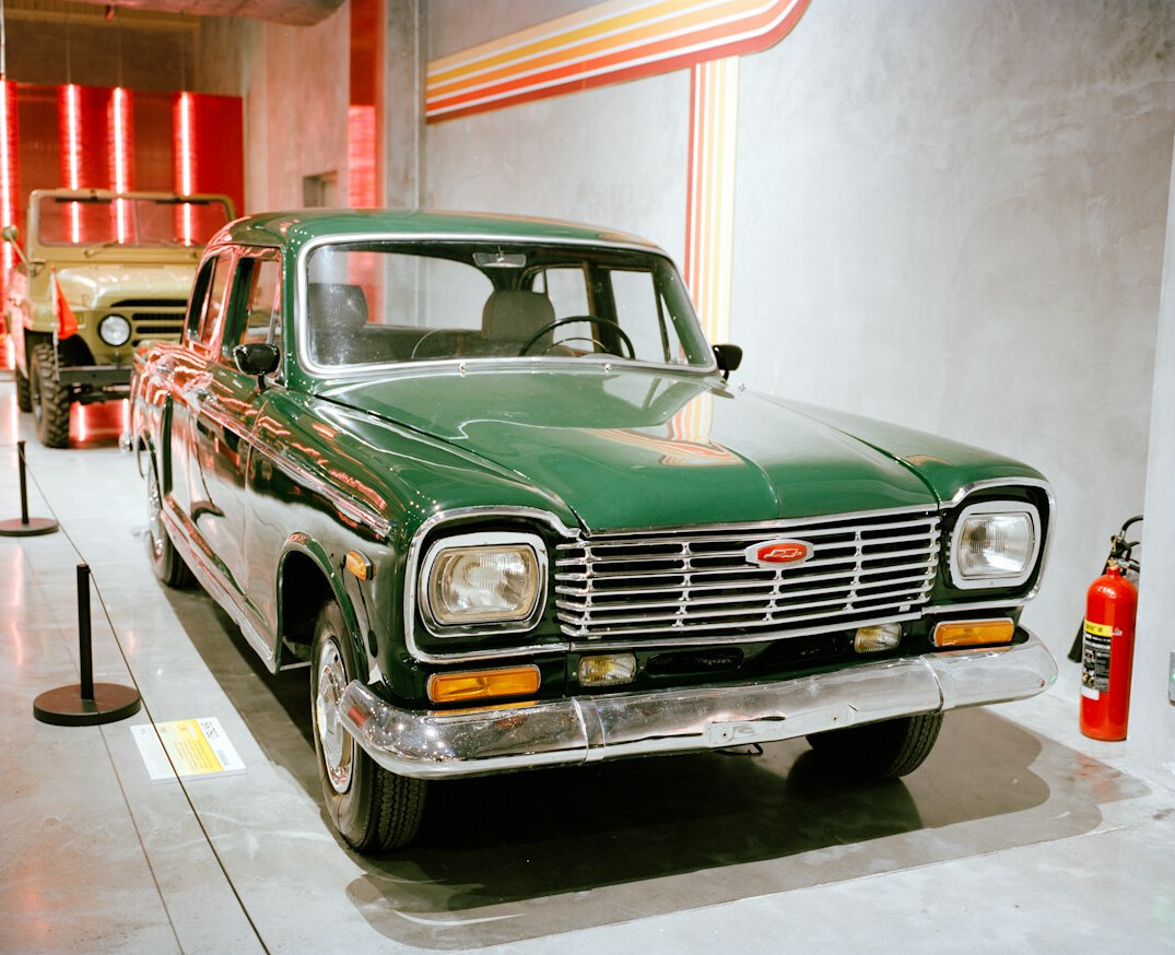 Interior of a classic car museum in Montevideo with polished vintage automobiles